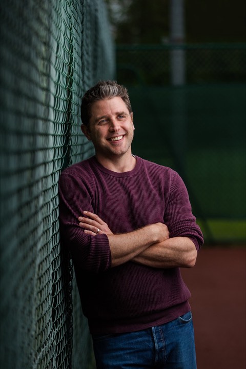 Portrait of a man with his arms crossed